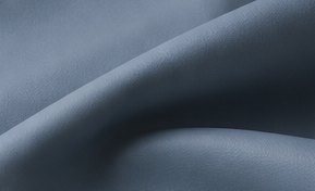 Close-up of softly folded mineral-blue plain silicone leather