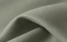 Close-up of softly folded sage-green plain silicone leather